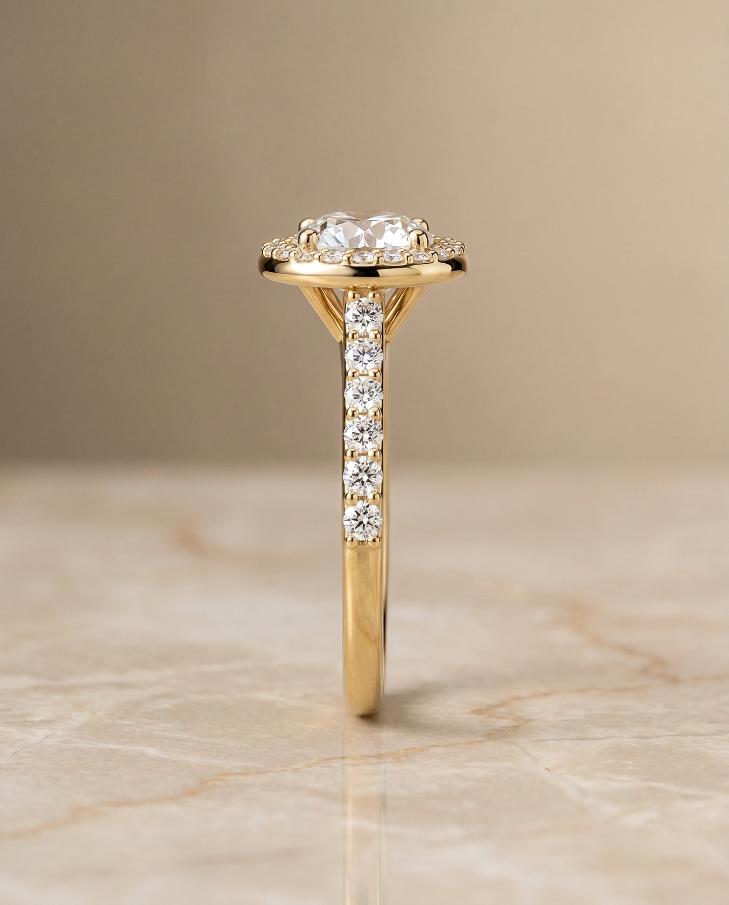 Round Brilliant, Shared Prong Halo Round, in 18K Yellow Gold, pave setting – side profile | RockHer