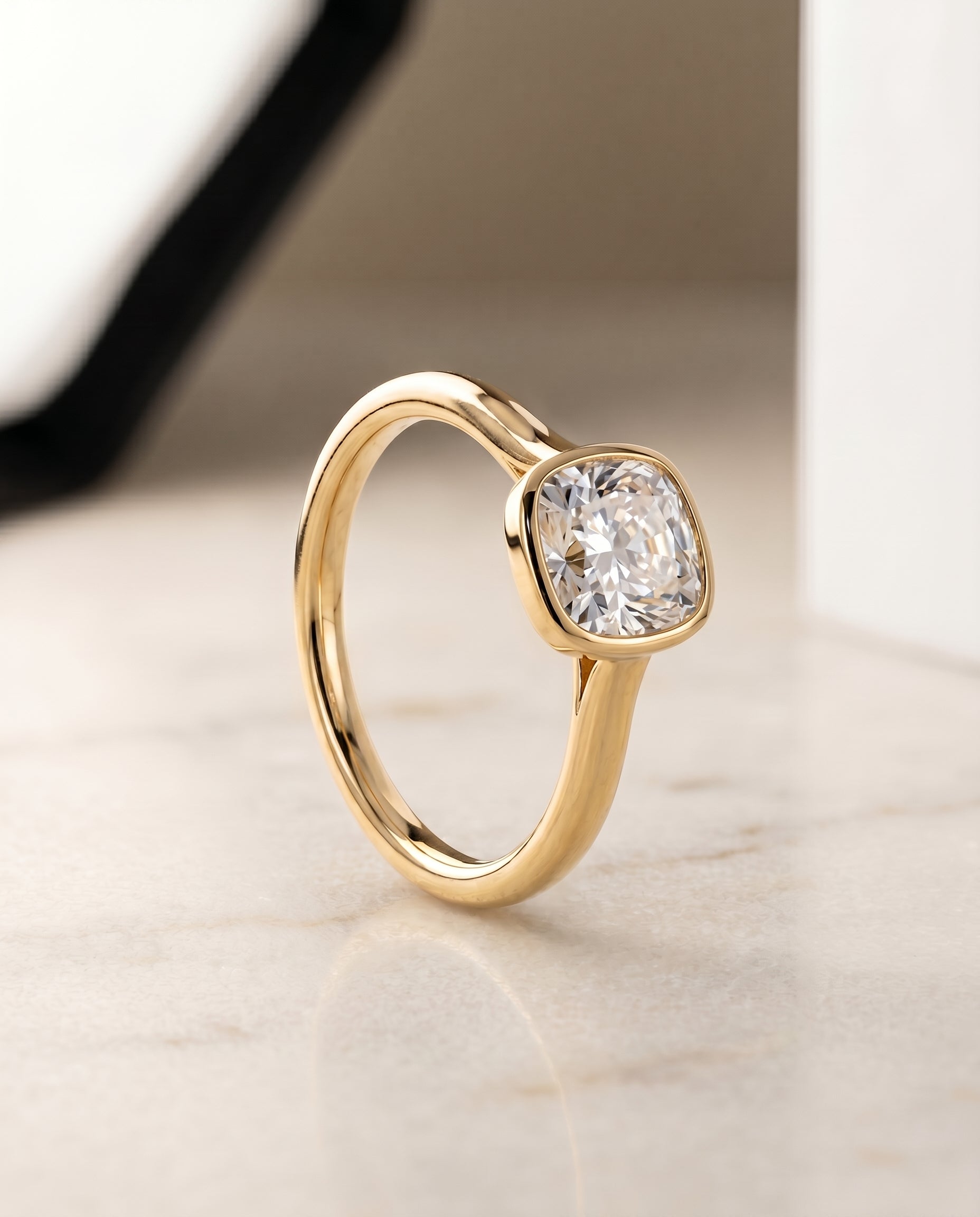 Duran Select Simple Bezel Solitaire Cushion Cut Lab Diamond Engagement Ring in 18K Yellow Gold, front view | RockHer