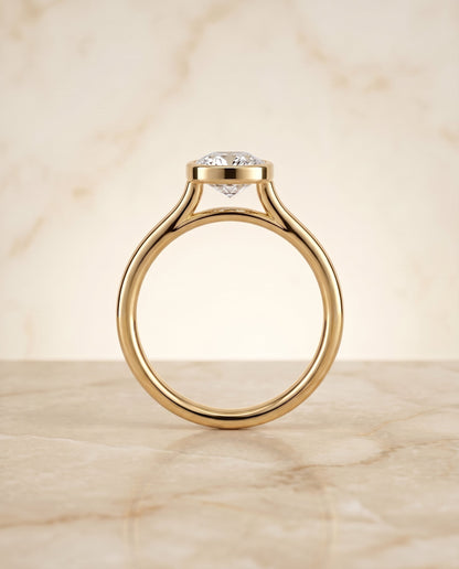 Duran Select Simple Bezel Solitaire Cushion Cut Lab Diamond Engagement Ring in 14K Yellow Gold, side view | RockHer