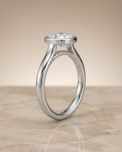 Duran Select Simple Bezel Solitaire Cushion Cut Lab Diamond Engagement Ring in Platinum, alternate angle | RockHer