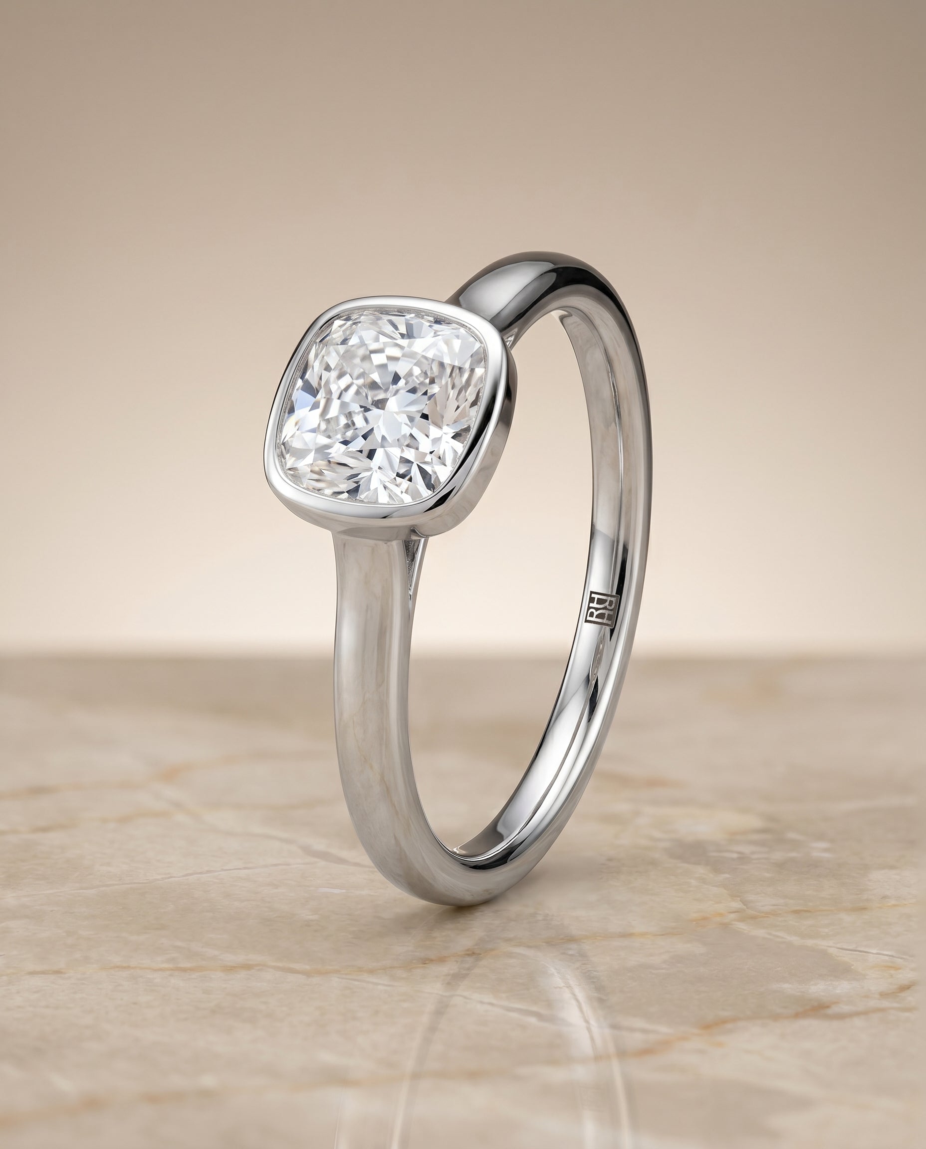 Duran Select Simple Bezel Solitaire Cushion Cut Lab Diamond Engagement Ring in 18K White Gold, front view | RockHer