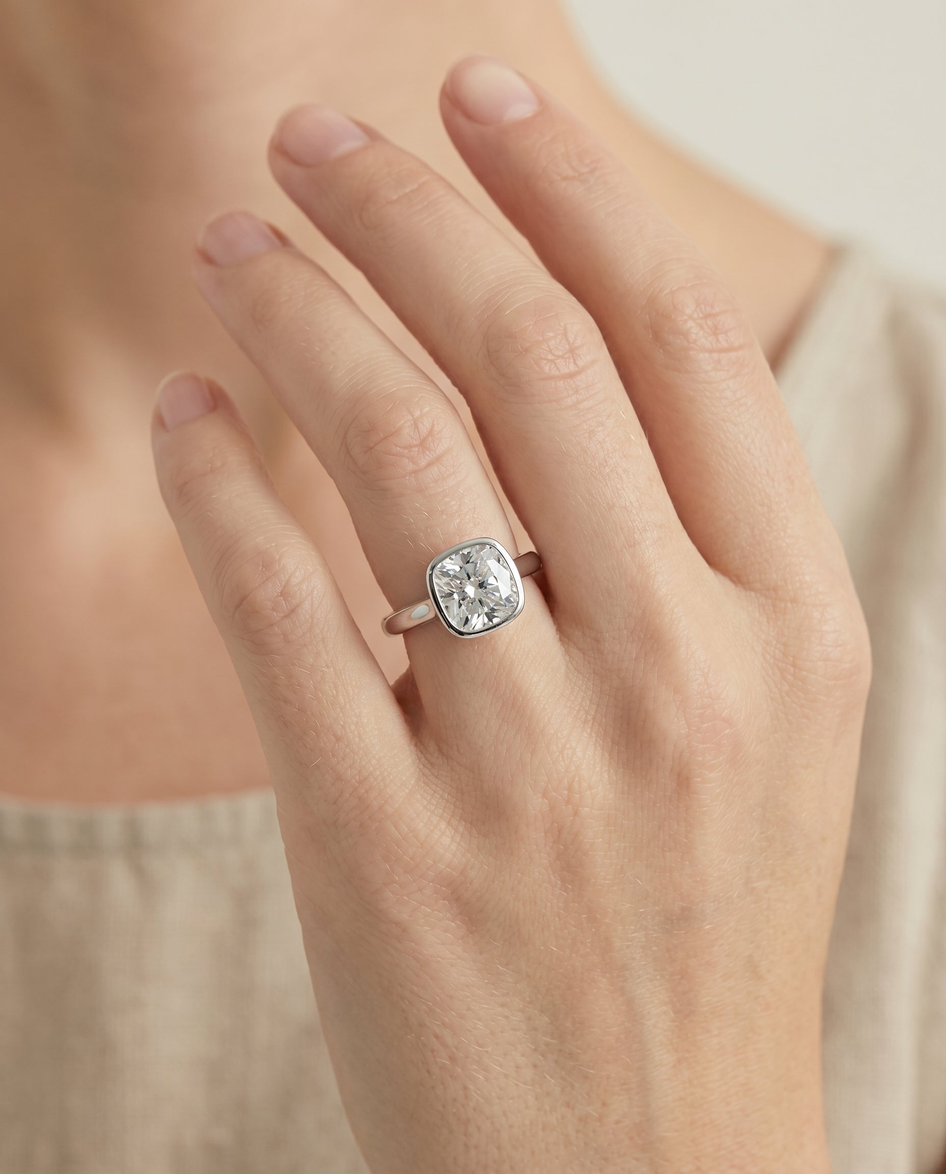 The Duran engagement ring setting in Platinum, simple bezel solitaire cut design | RockHer