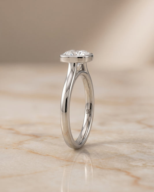 Simple Bezel Solitaire Cushion in Platinum
