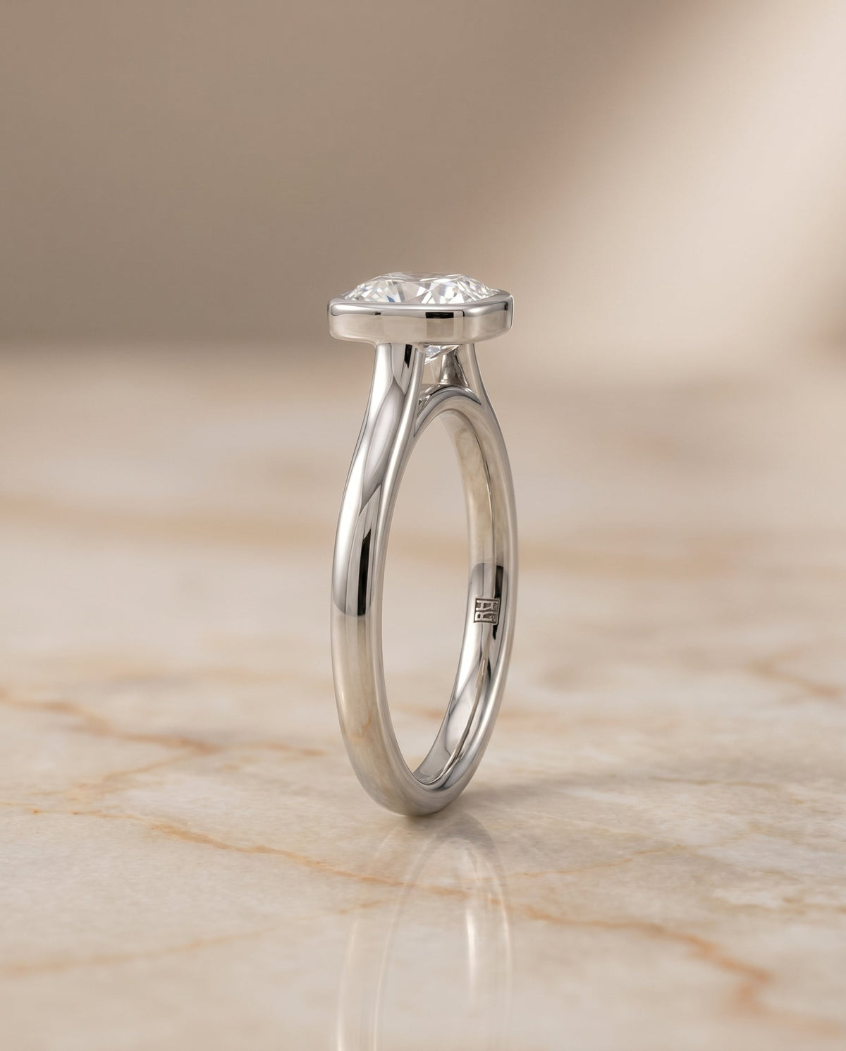 Duran Select Simple Bezel Solitaire Cushion Cut Lab Diamond Engagement Ring in 18K White Gold, side view | RockHer