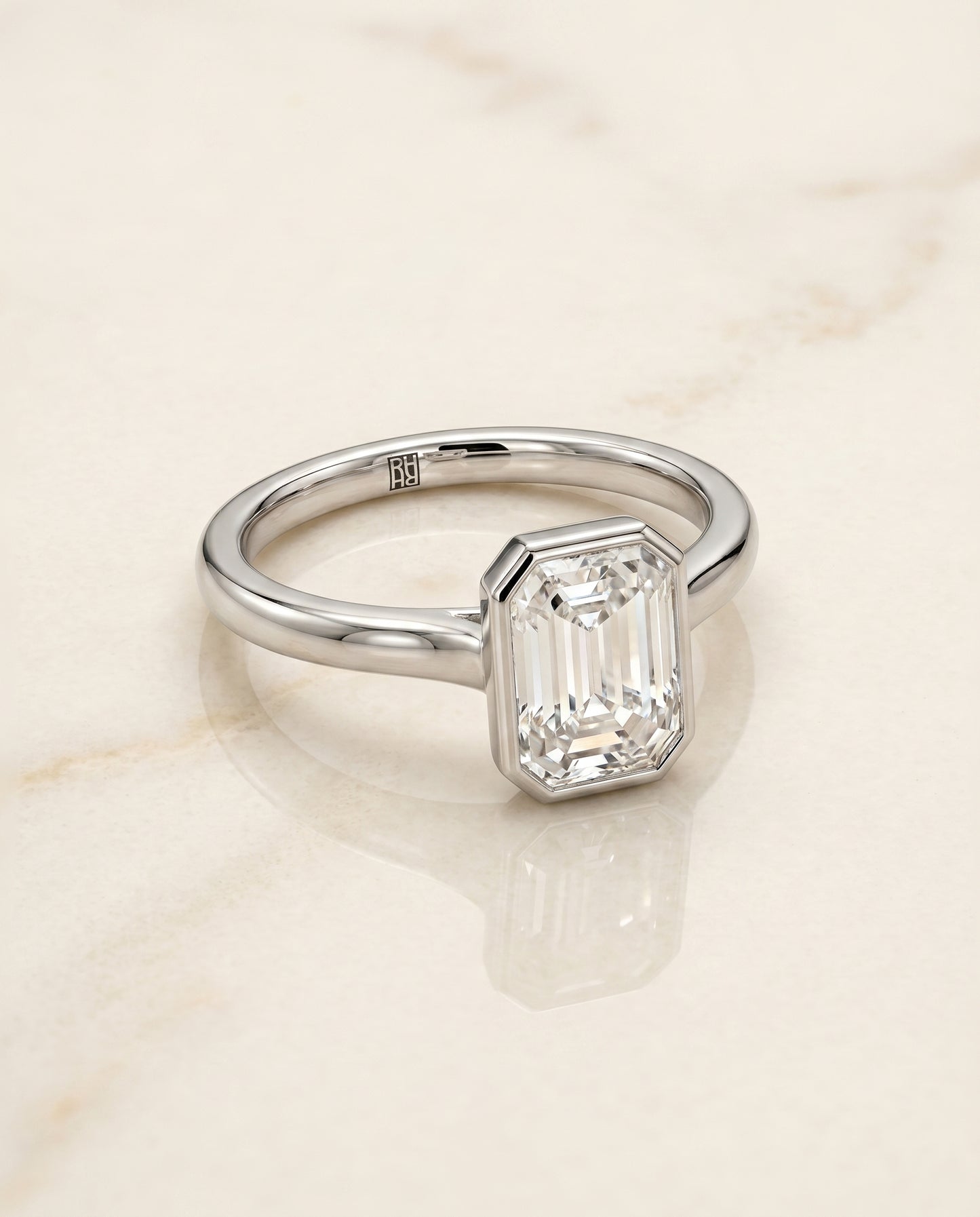 The Duran Bezel Solitaire Engagement Ring Setting for Emerald Cut Diamonds in Platinum | RockHer