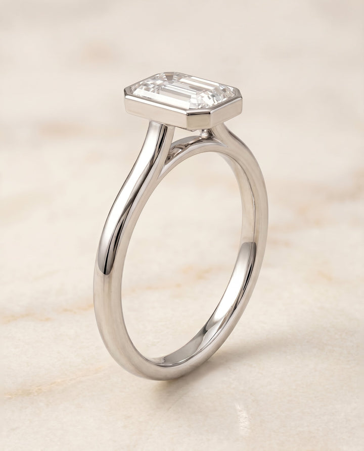 Duran Select Simple Bezel Solitaire Emerald Cut in 18K White Gold – view 2
