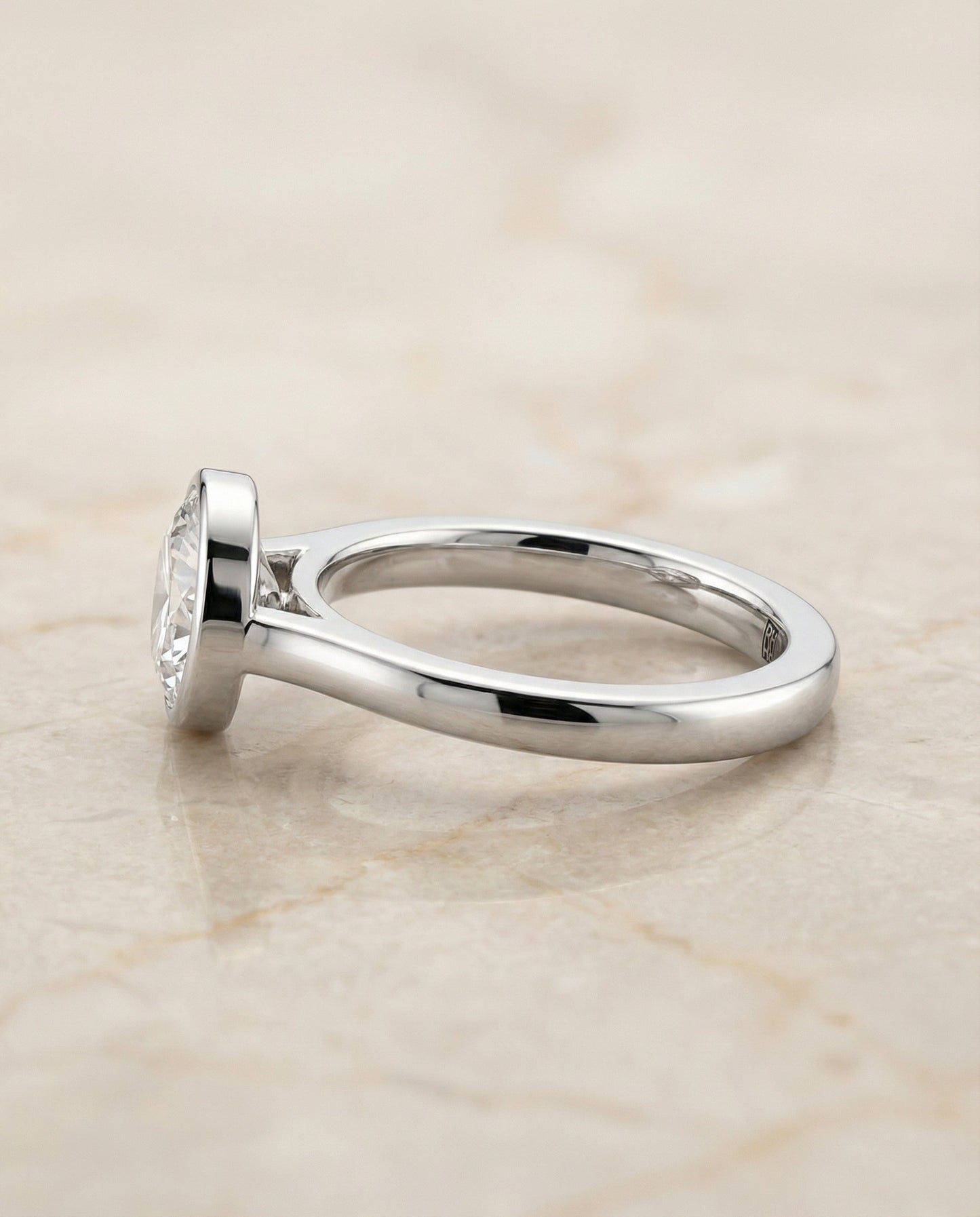The Duran Select Simple Bezel Solitaire Engagement Ring with Lab Diamond in Platinum — view 6