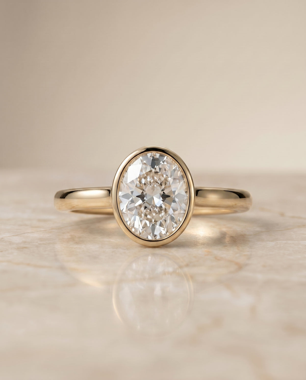 The Duran Bezel Solitaire Engagement Ring Setting for Round Diamonds in 18K Yellow Gold | RockHer