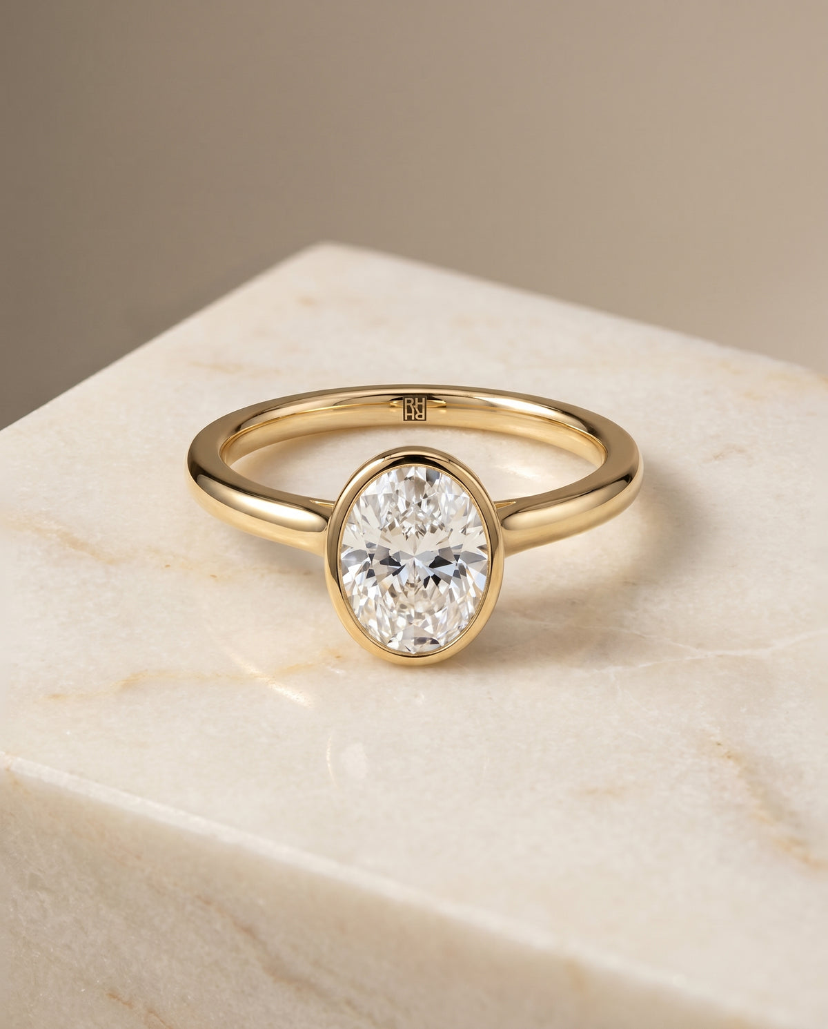 The Duran Bezel Solitaire Engagement Ring Setting for Oval Diamonds in 18K Yellow Gold | RockHer