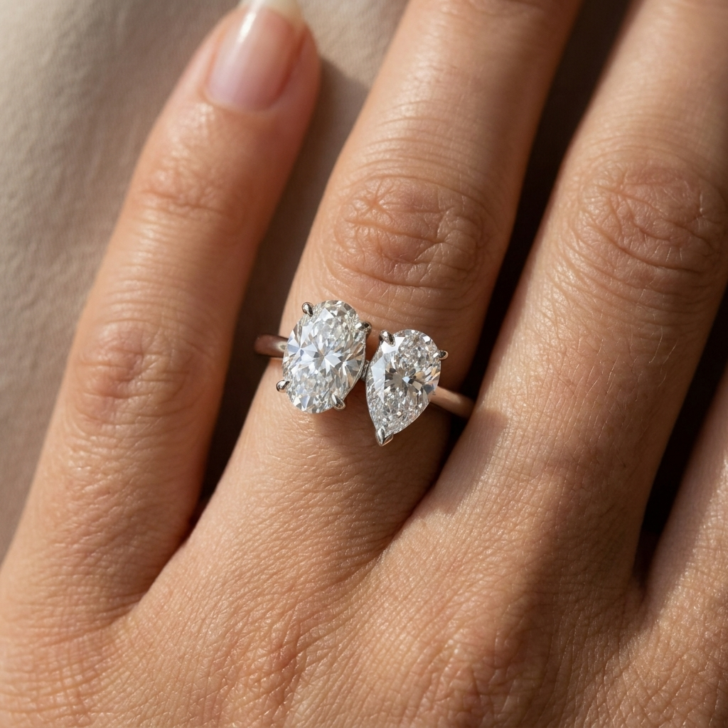 18K White Gold Solange Toi et Moi Select Oval & Pear Lab Diamond Engagement Ring - Macro close-up on finger