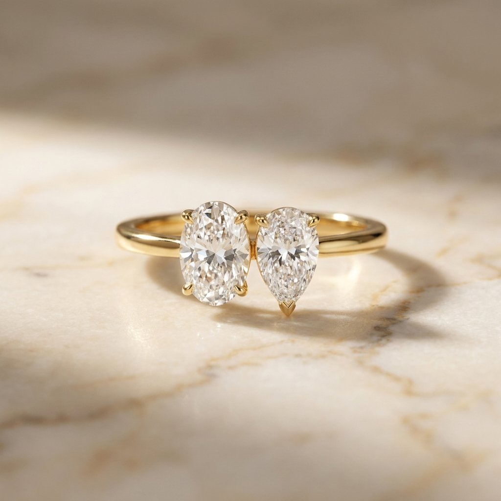 18K Yellow Gold Solange Toi et Moi Select Oval & Pear Lab Diamond Engagement Ring - Hero on warm marble