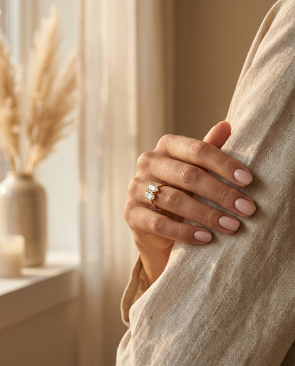 18K Yellow Gold Solange Toi et Moi Select Oval & Pear Lab Diamond Engagement Ring - Lifestyle scene with hand model