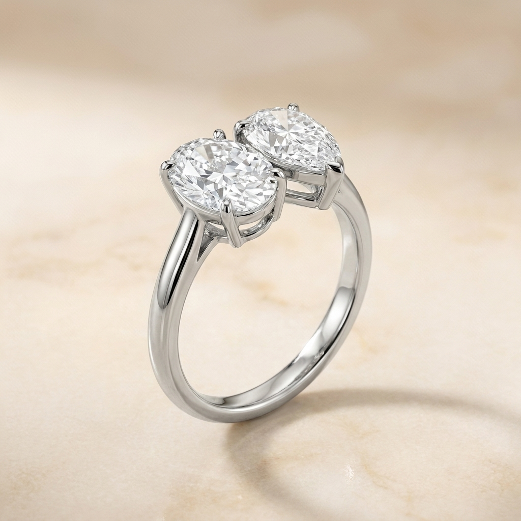 Platinum Solange Toi et Moi Select Oval & Pear Lab Diamond Engagement Ring - Alt angle on warm marble
