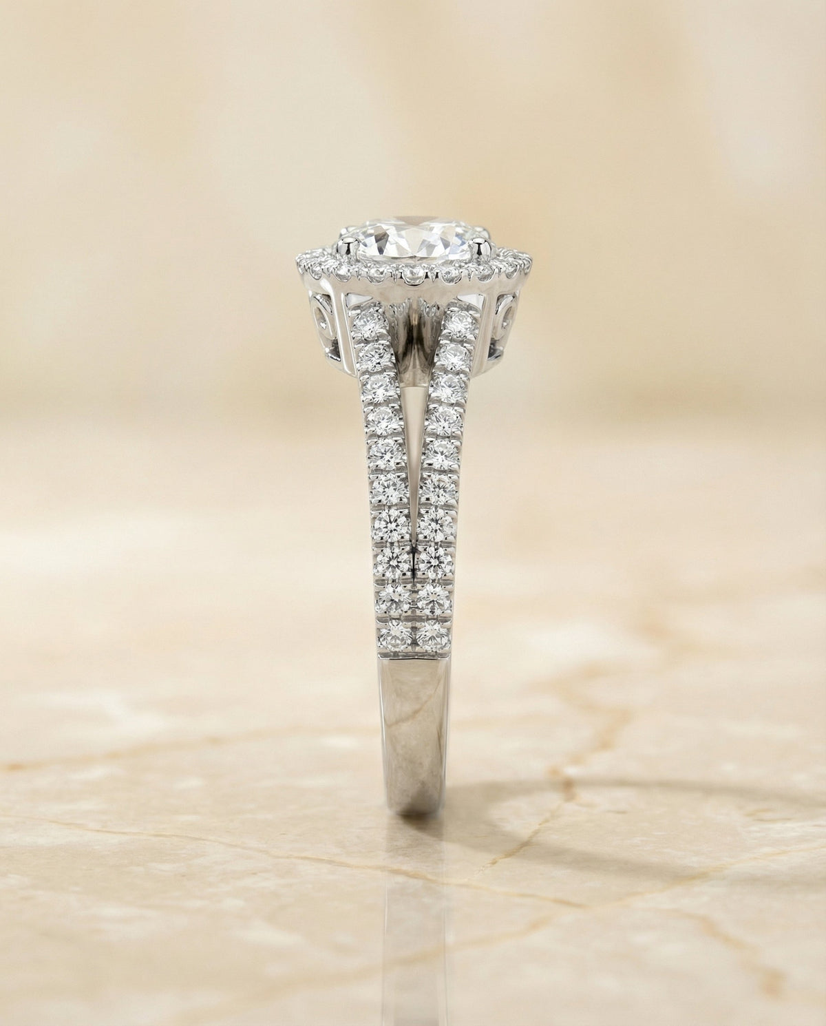 Aretha Select Pav Halo Split Shank Round Lab Diamond Engagement Ring in Platinum, side view | RockHer