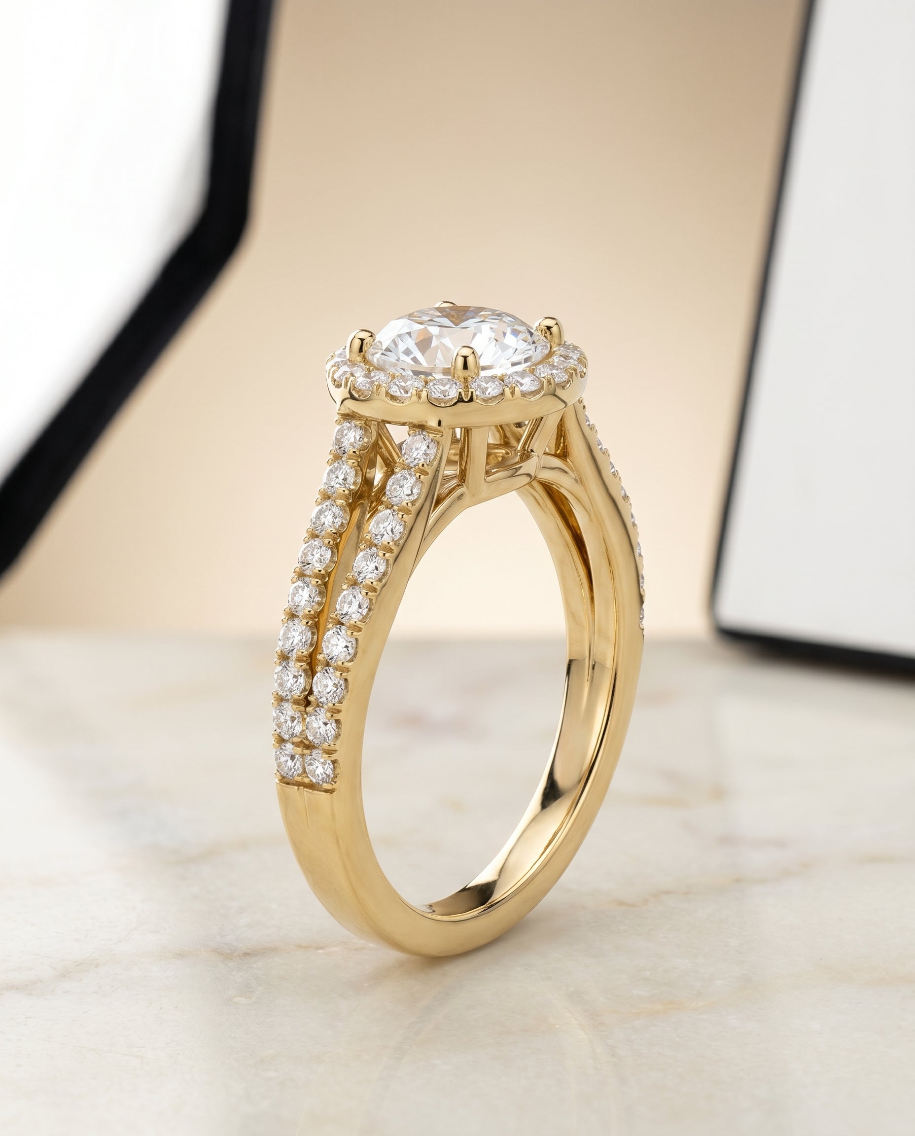 Nicki Select Split Shank Pavé Halo Round Lab Diamond Engagement Ring in 18K Yellow Gold, front view | RockHer