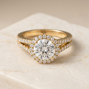 The Aretha Split Shank Pavé Halo Round Engagement Ring Setting in 18K Yellow Gold
