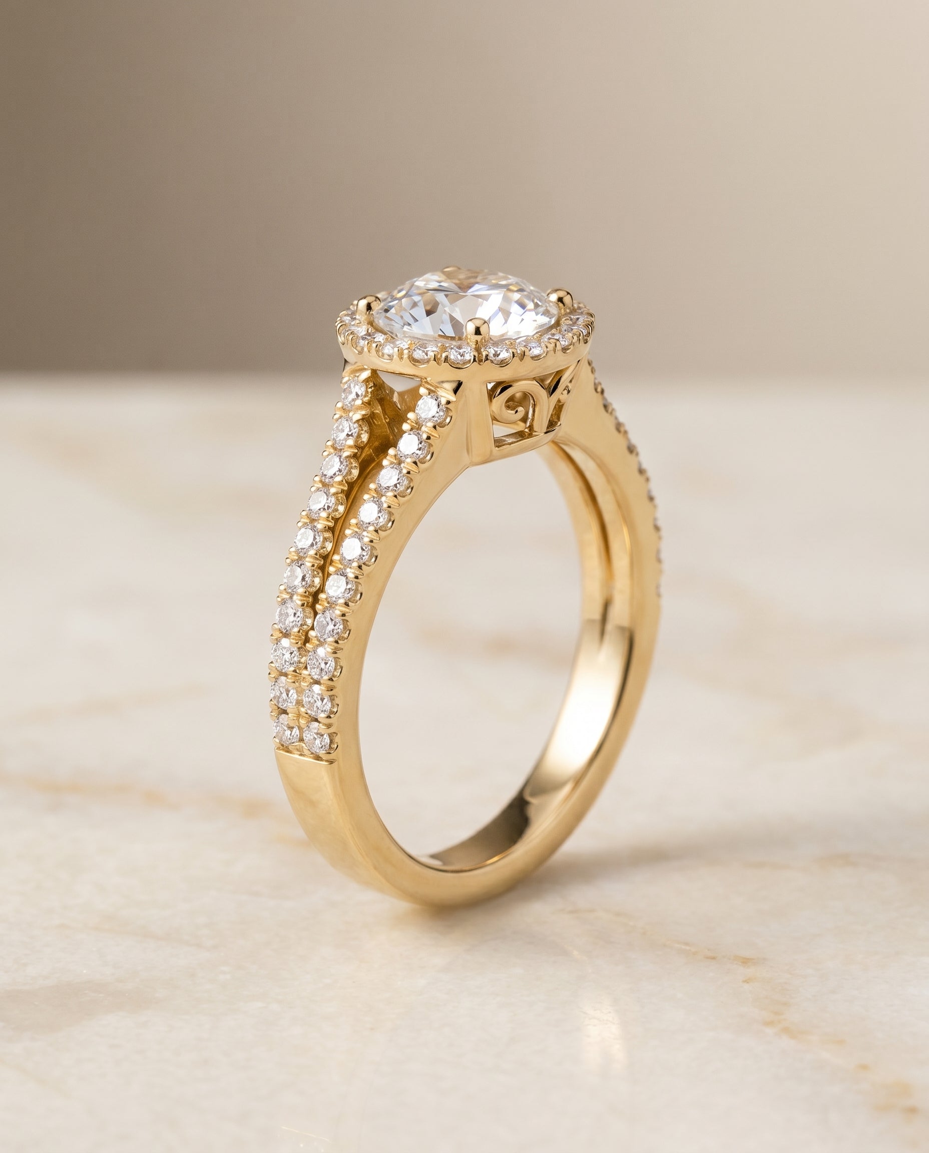 Split Shank Pavé Halo styling on The Aretha round engagement ring setting | RockHer