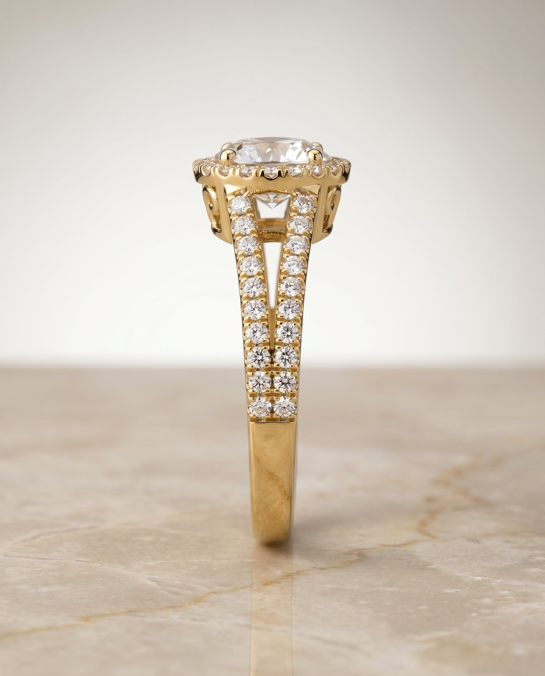 The Aretha split shank pavé halo engagement ring setting, shown in 18K Yellow Gold | RockHer