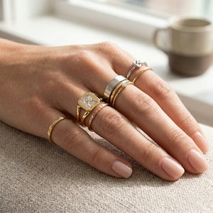 Women's Split Shank lab-grown diamond letter signet ring in 14K Yellow Gold, letter R, worn on hand