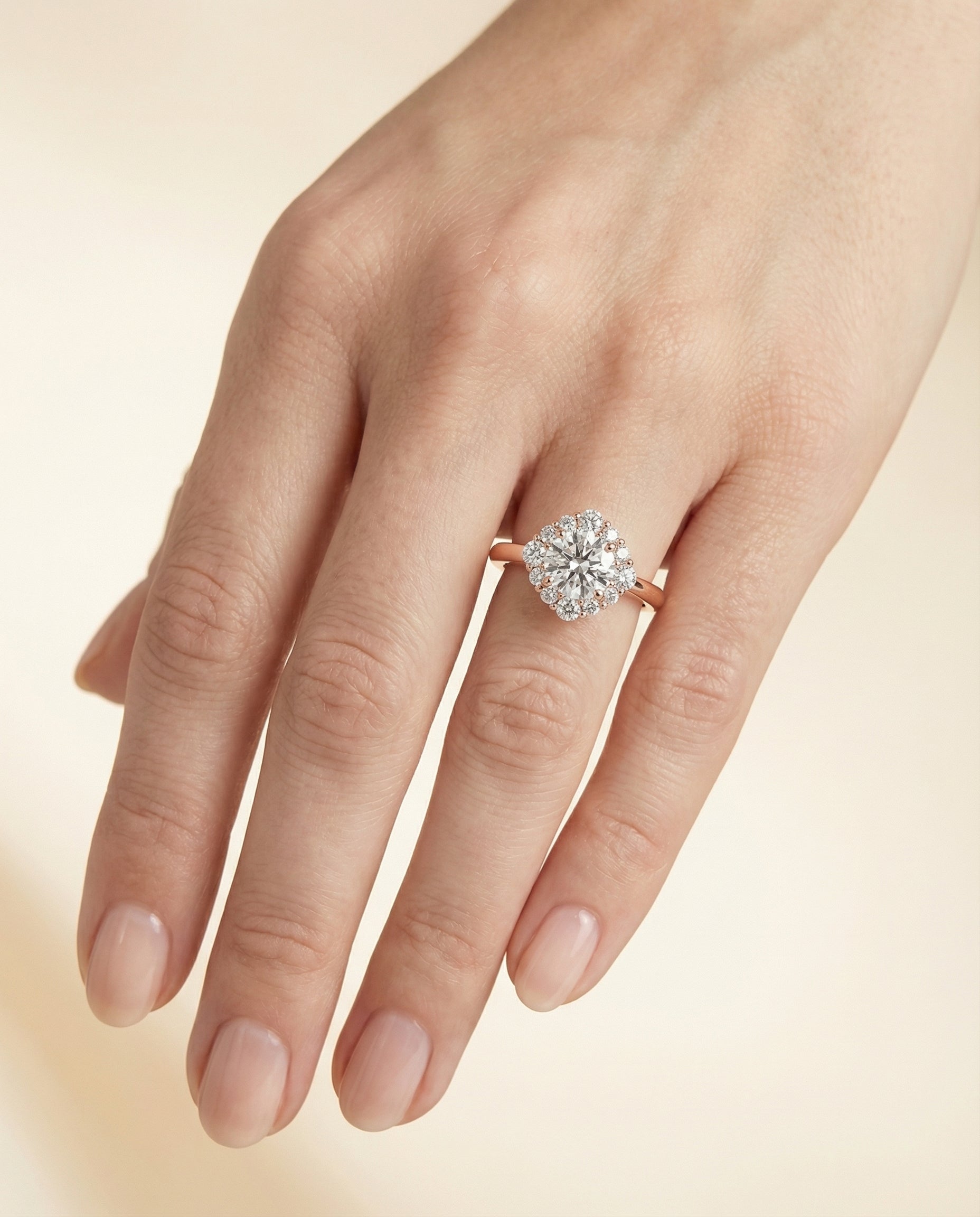 The Tionne setting for round diamonds, made to order in 14K Rose Gold | RockHer