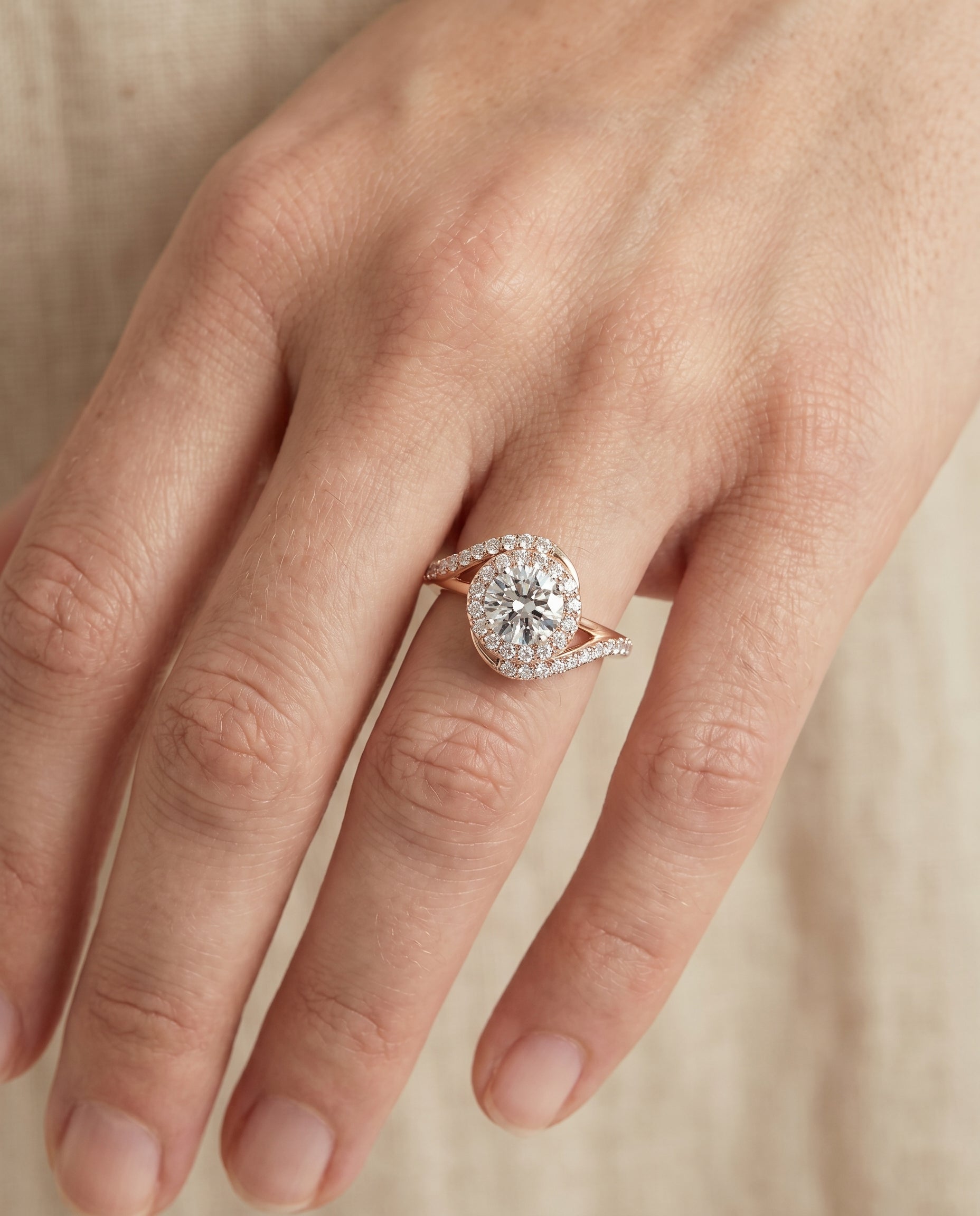 The Ariana engagement ring setting in 14K Rose Gold, swirl halo design | RockHer