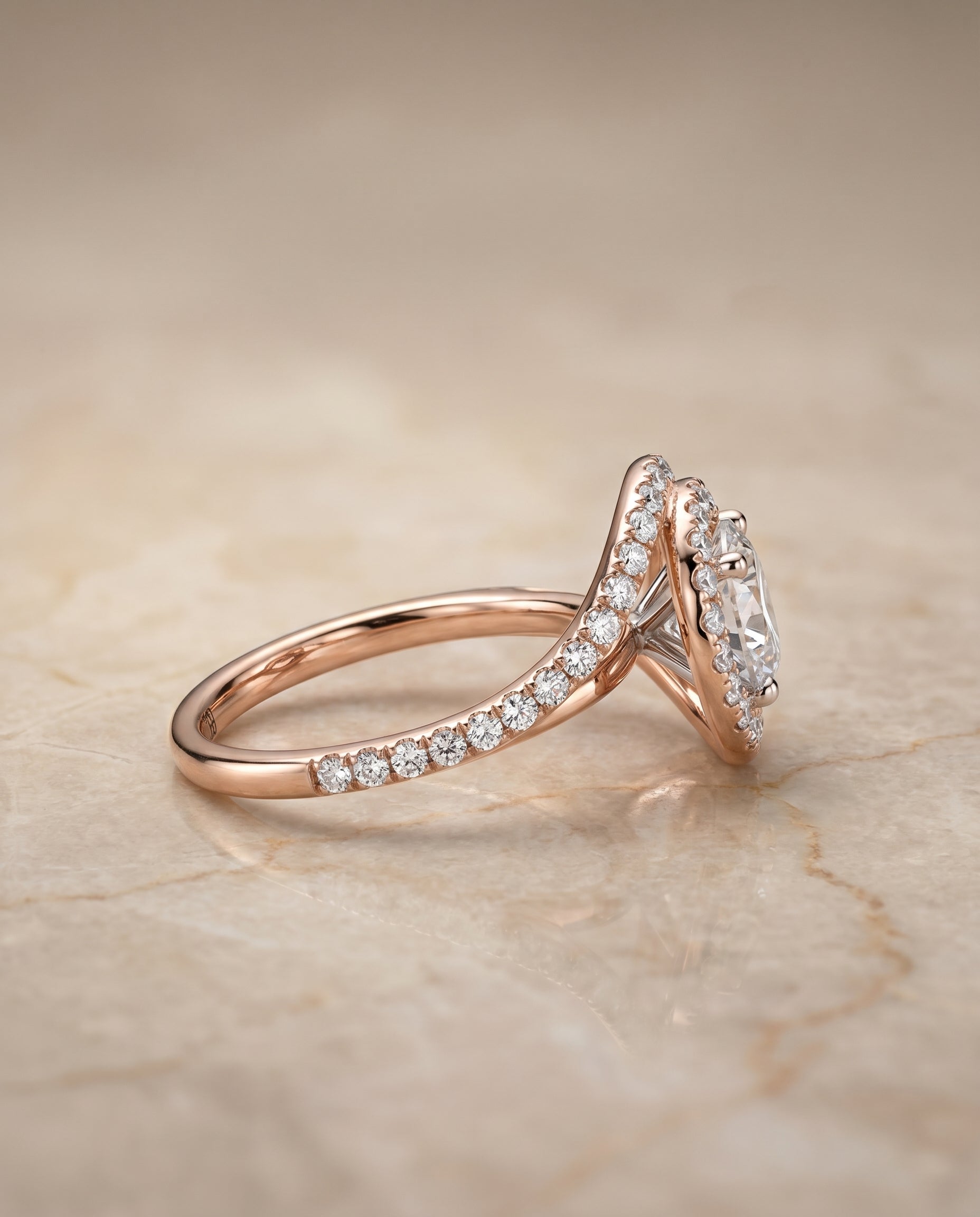 Ariana Select Swirl Halo Round Lab Diamond Engagement Ring in 14K Rose Gold, side view | RockHer