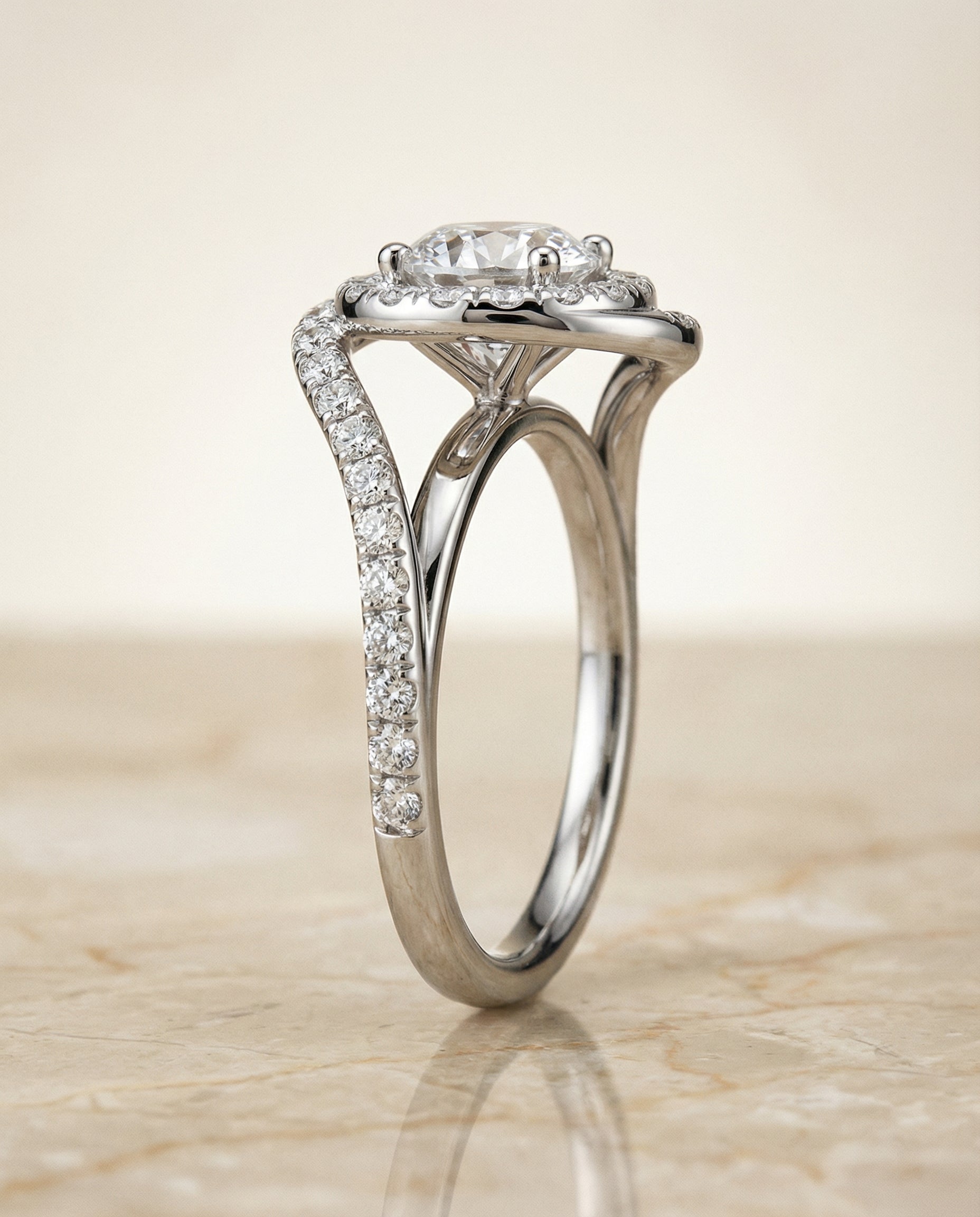 The Ariana swirl halo engagement ring setting, shown in Platinum | RockHer