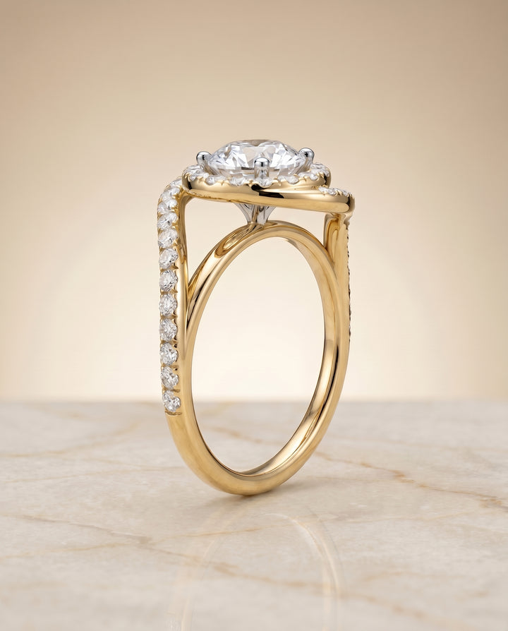 Round Brilliant, Swirl Twist Pavé Halo, in 18K Yellow Gold, pave setting – angled view | RockHer