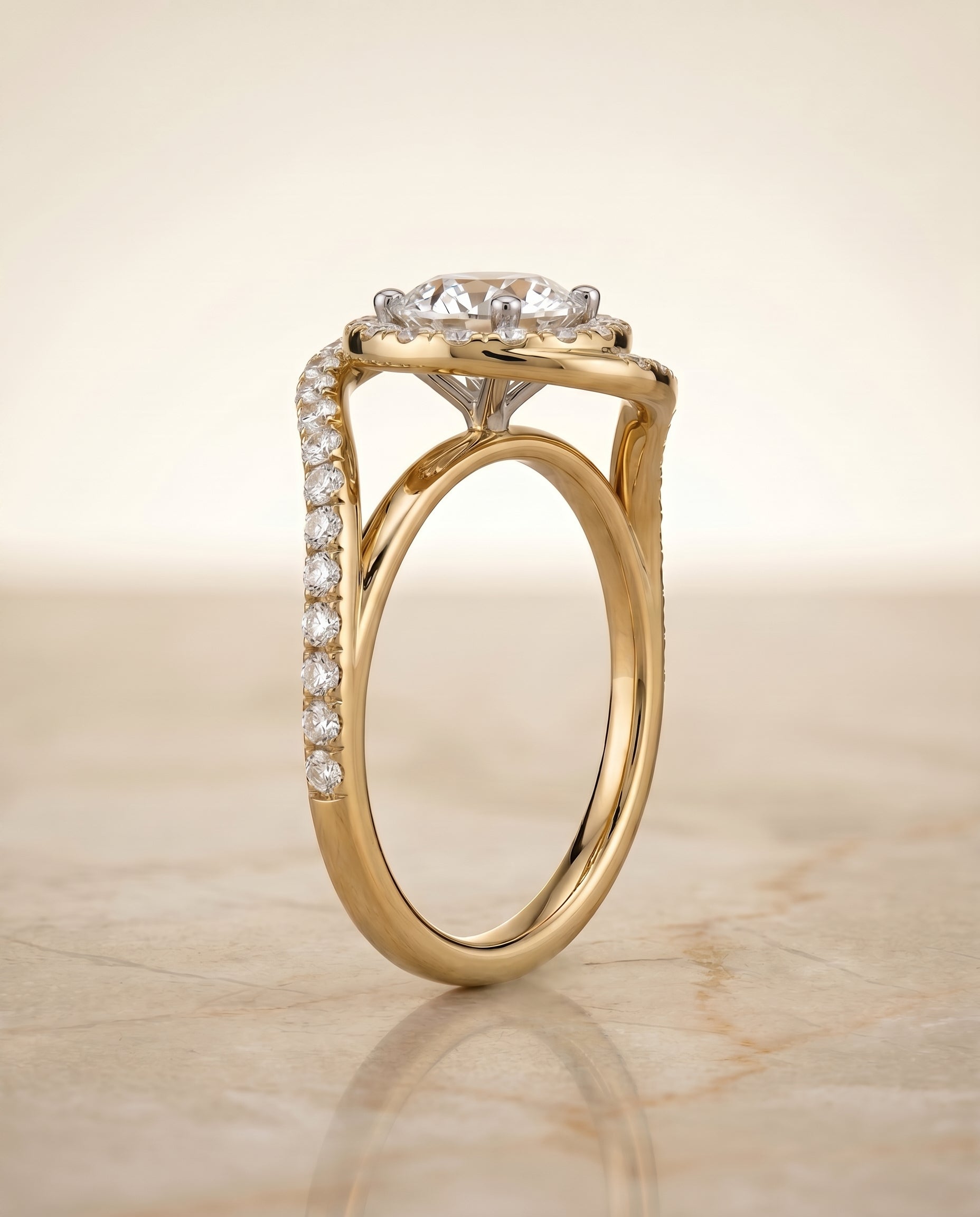 The Ariana swirl halo engagement ring setting, shown in 18K Yellow Gold | RockHer