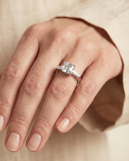 Tapered Baguette Three Stone Asscher, in Platinum, channel setting – lifestyle shot | RockHer