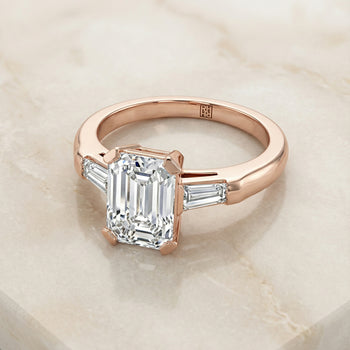 The Caroline Three Stone Emerald Cut Engagement Ring Setting in 14K Rose Gold