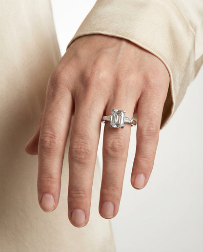 European Cut, Tapered Baguette Three Stone Emerald, in Platinum – lifestyle shot | RockHer