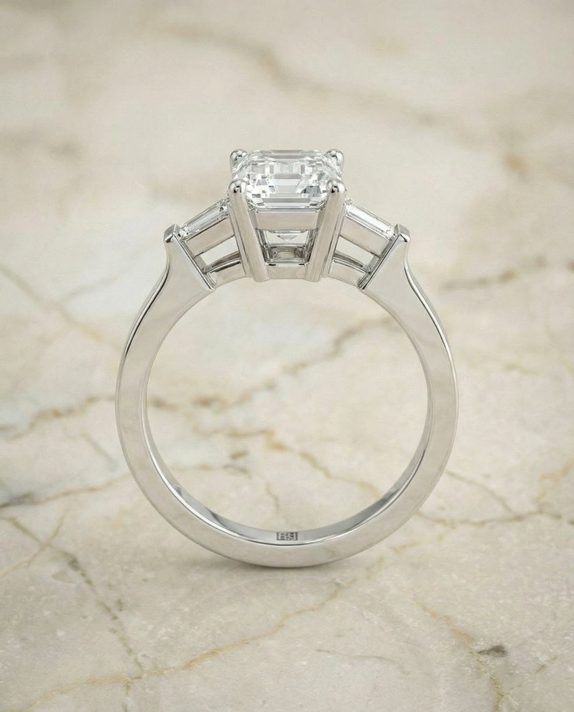 The June three stone cut engagement ring setting, shown in Platinum | RockHer