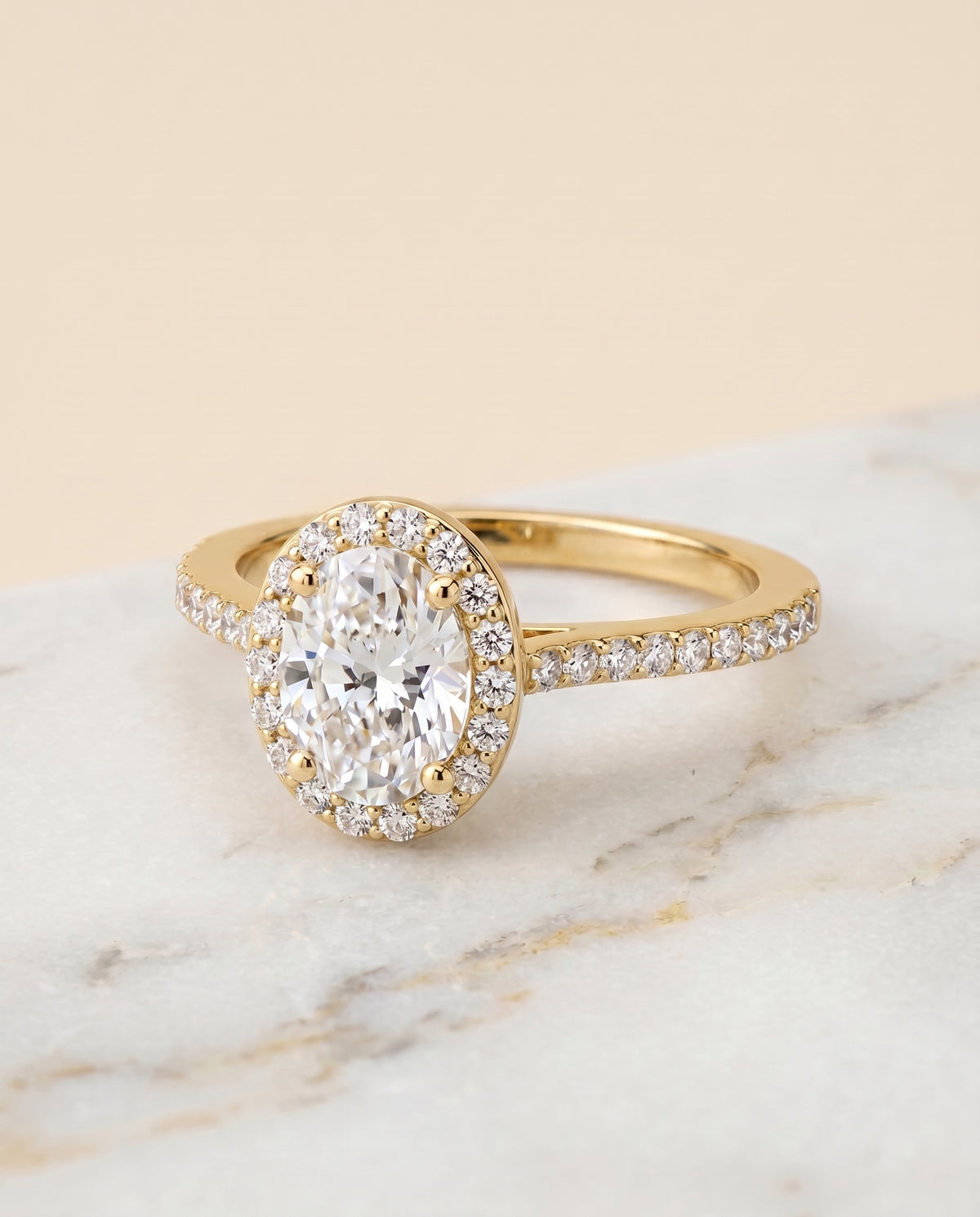 The Taylor Pavé Halo Engagement Ring Setting for Oval Diamonds in 18K Yellow Gold | RockHer