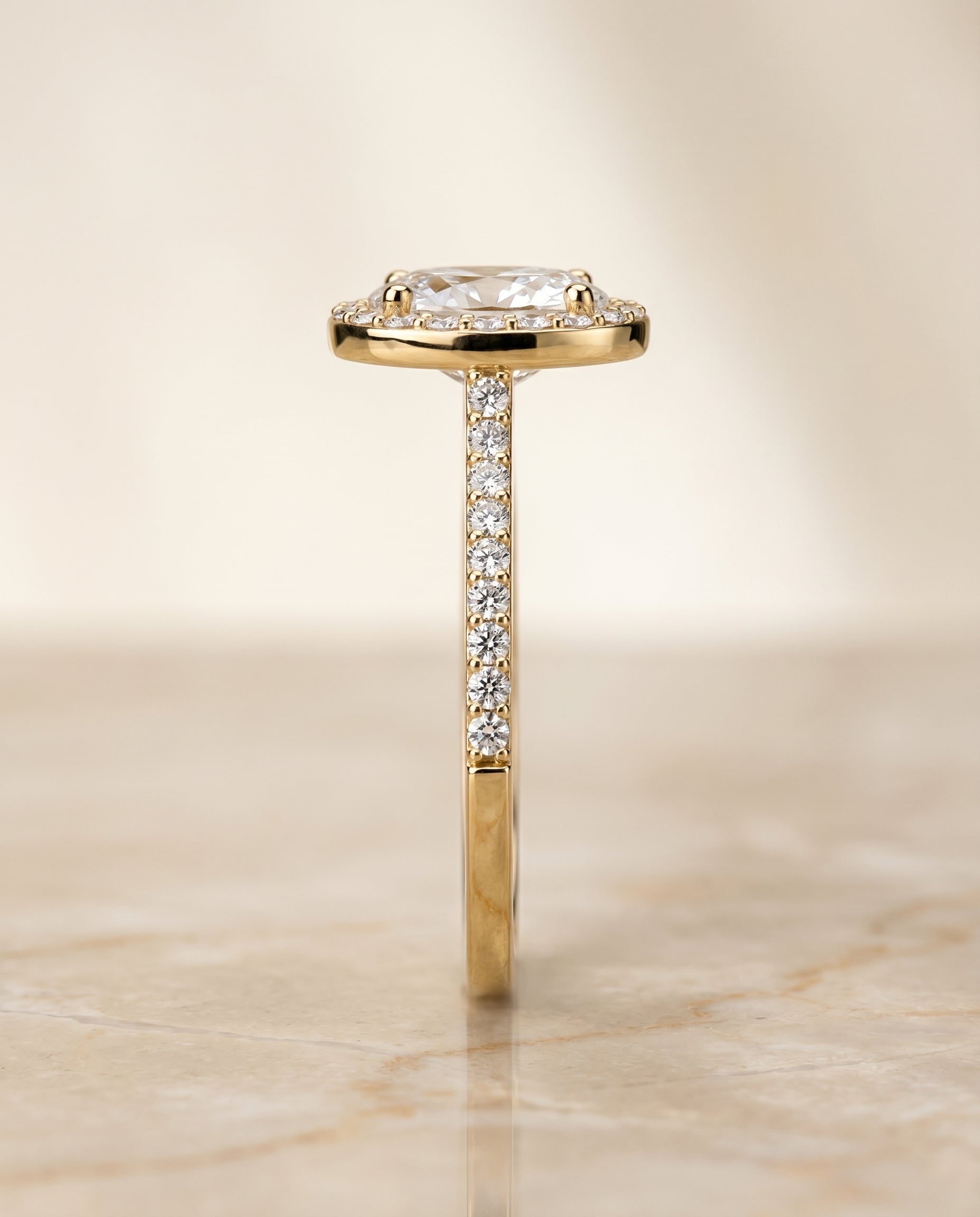 Taylor Select Pavé Halo Oval Lab Diamond Engagement Ring in 18K Yellow Gold, side view | RockHer