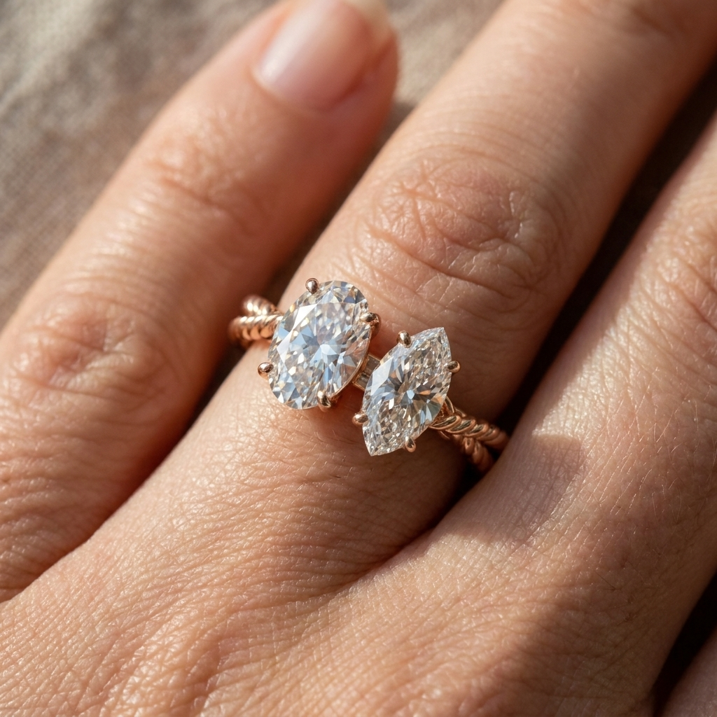 14K Rose Gold Taylor Select Toi et Moi Oval & Marquise Twisted Band Lab Diamond Engagement Ring - Macro close-up on finger