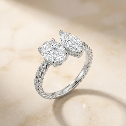 14K White Gold Taylor Select Toi et Moi Oval & Marquise Twisted Band Lab Diamond Engagement Ring - Alt angle on warm marble