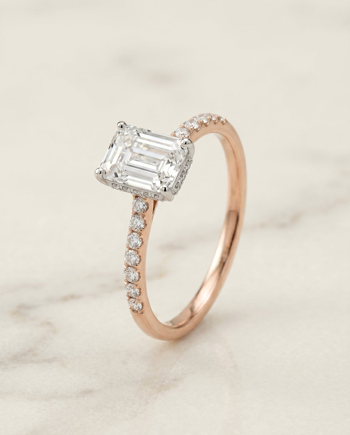 Select Hidden Halo Pavé Cut styling on The Abbey emerald engagement ring setting | RockHer