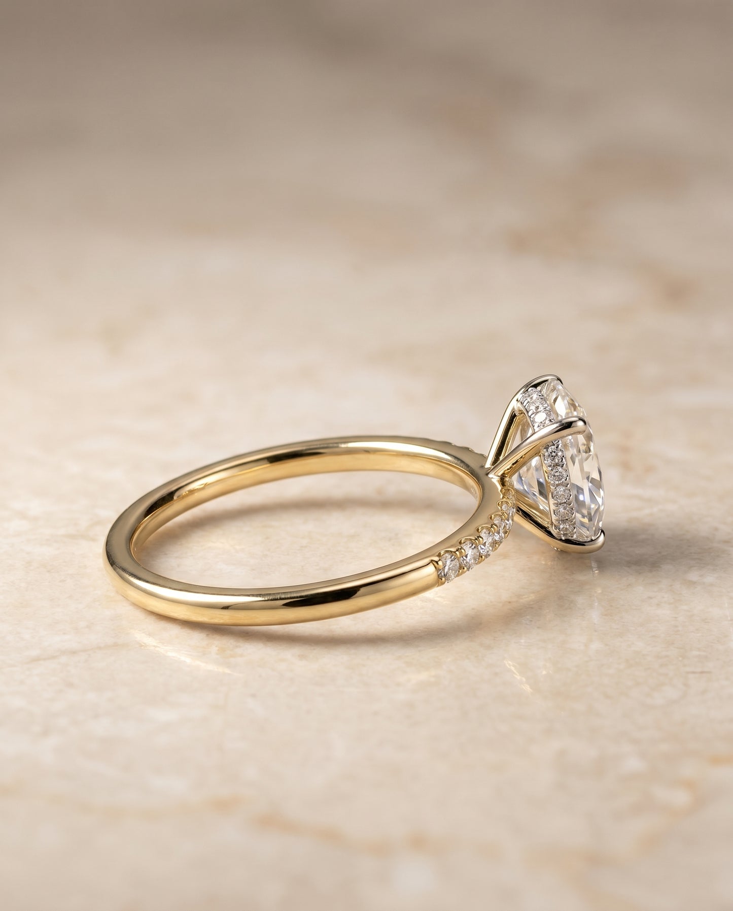 The Abbey Solitaire Engagement Ring Setting for Oval Diamonds in 18K Yellow Gold