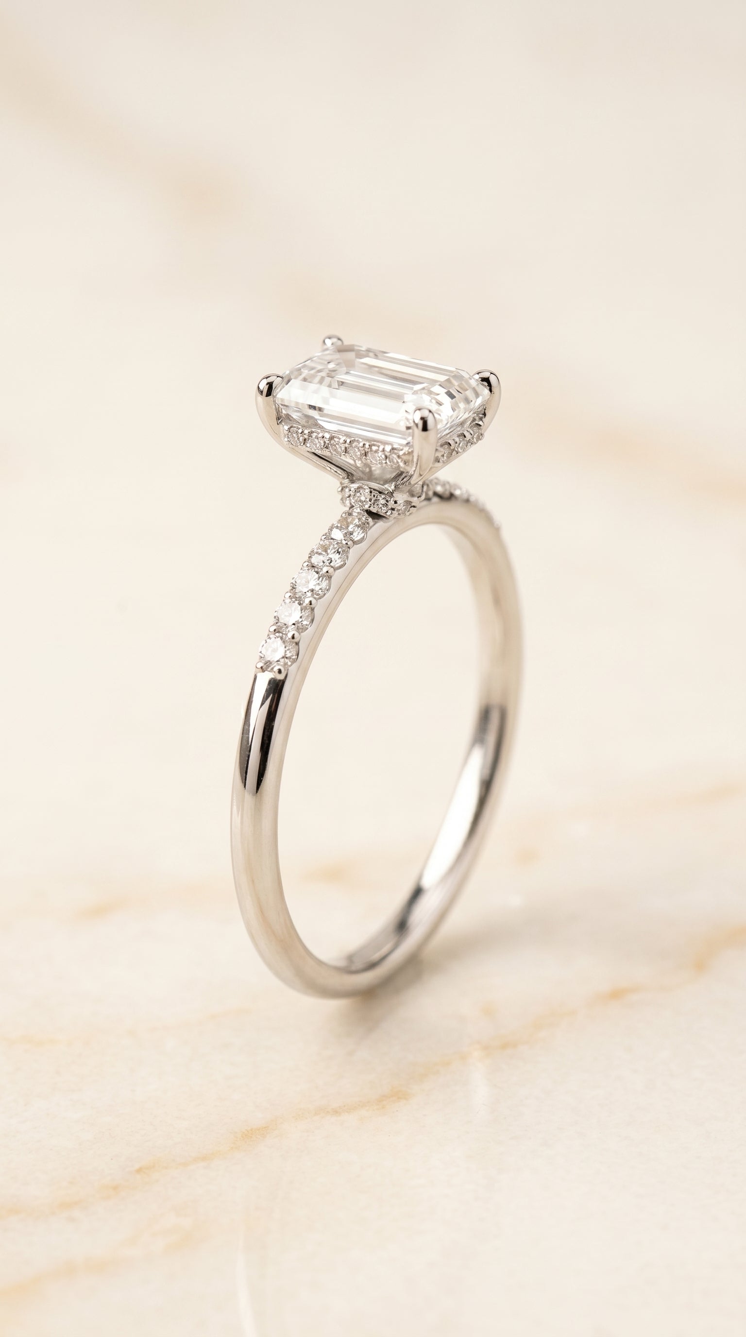 Hidden Halo Pavé Cut styling on The Abbey emerald engagement ring setting | RockHer