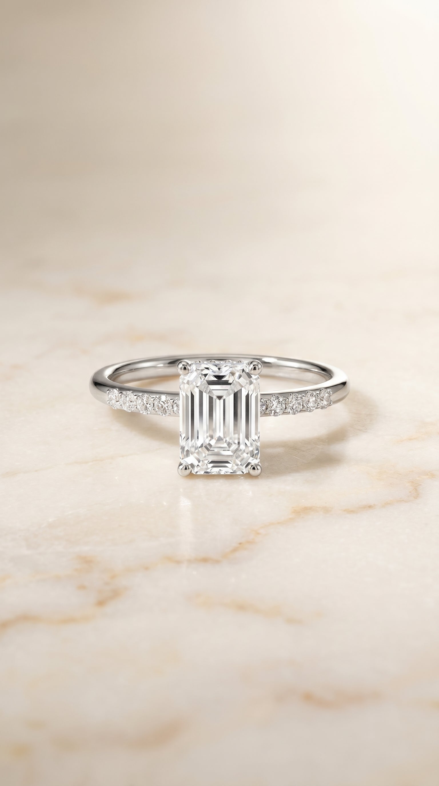 The Abbey Hidden Halo Solitaire Engagement Ring Setting for Emerald Cut Diamonds in Platinum