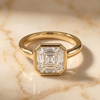 The Agnes Bezel Solitaire In Asscher Cut Engagement Ring Setting in 18K Yellow Gold