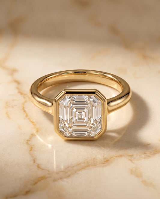 The Agnes Bezel Solitaire Engagement Ring Setting for Asscher Diamonds in 18K Yellow Gold