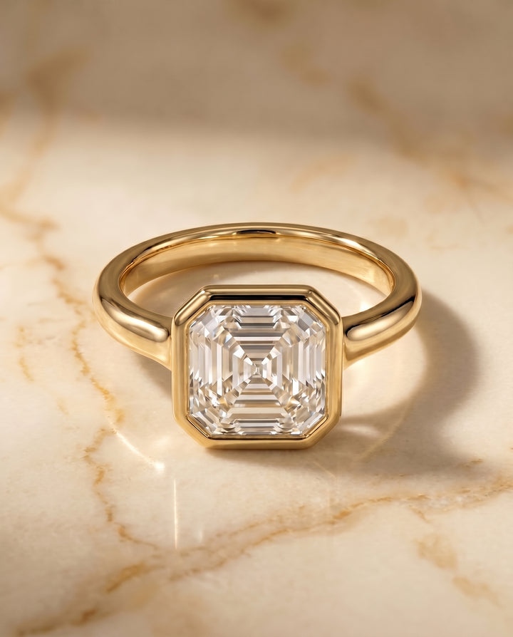 The Agnes Bezel Solitaire In Asscher Cut Engagement Ring Setting in 18K Yellow Gold