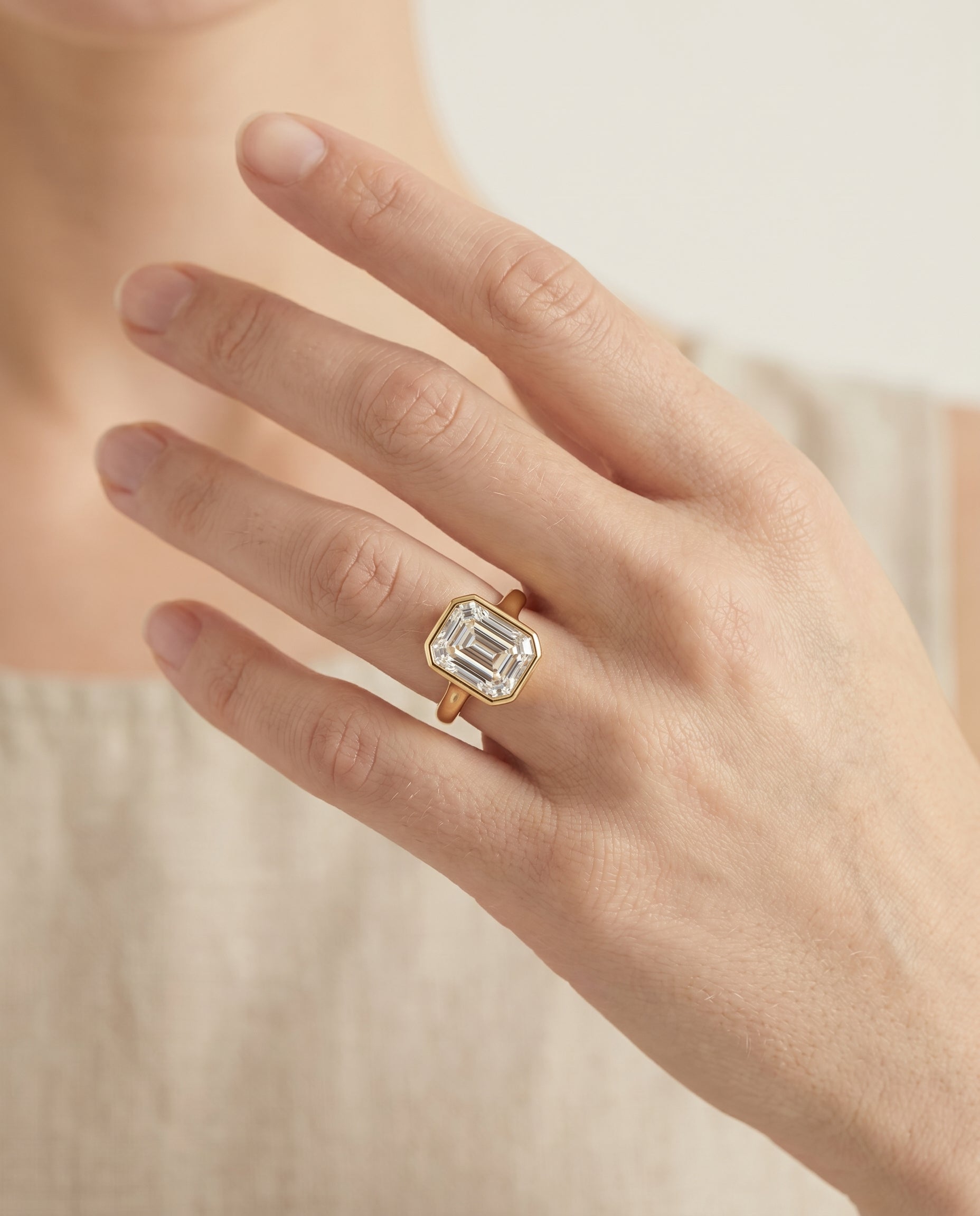 The Agnes engagement ring setting in 18K Yellow Gold, bezel solitaire in cut design | RockHer