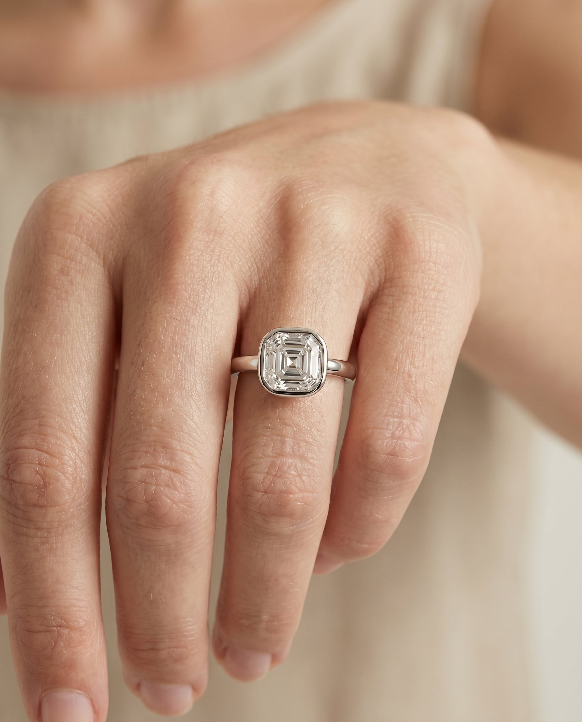 The Agnes engagement ring setting in 18K White Gold, bezel solitaire in cut design | RockHer