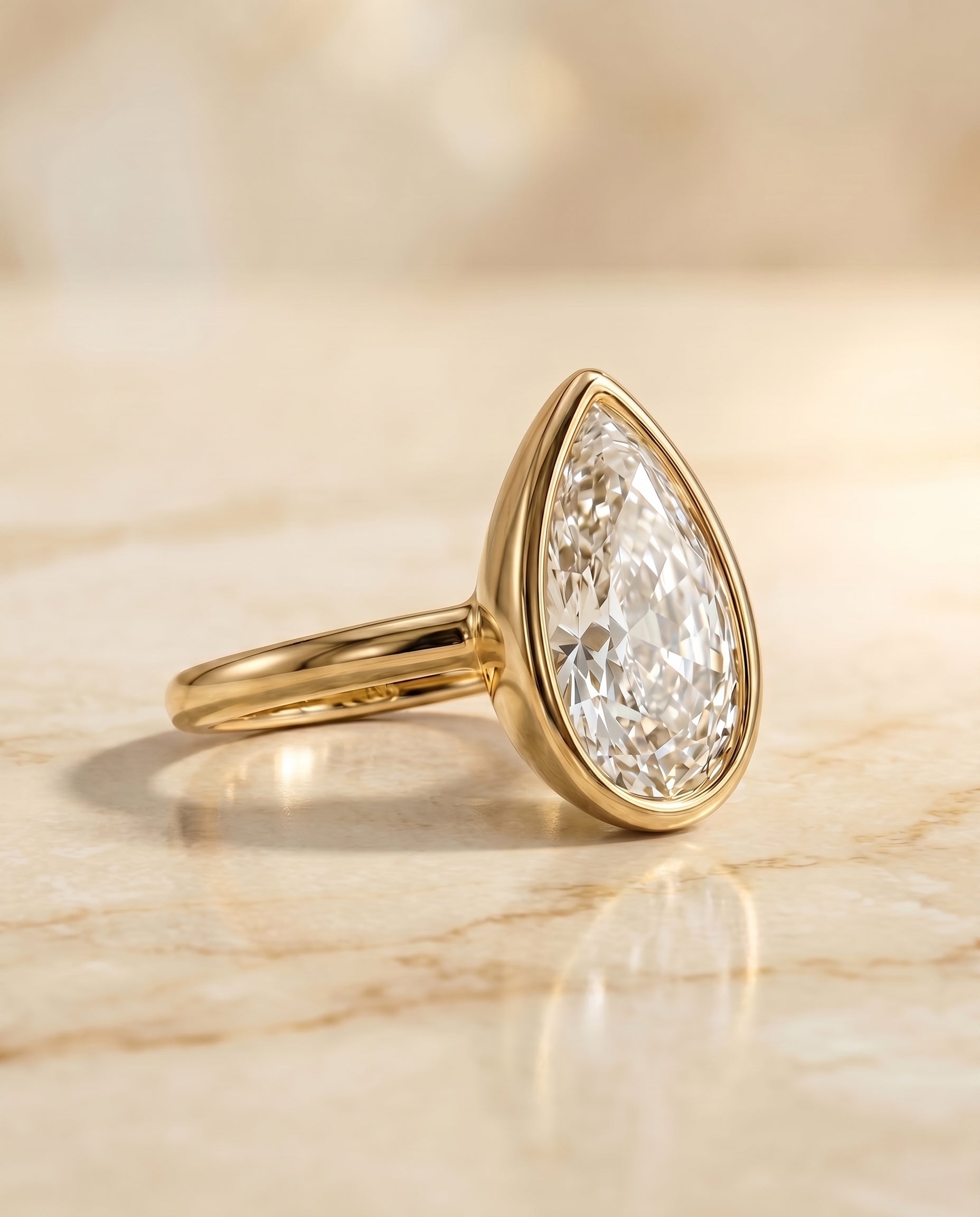 The Agnes Bezel Solitaire In Briolette Engagement Ring Setting in 18K Yellow Gold