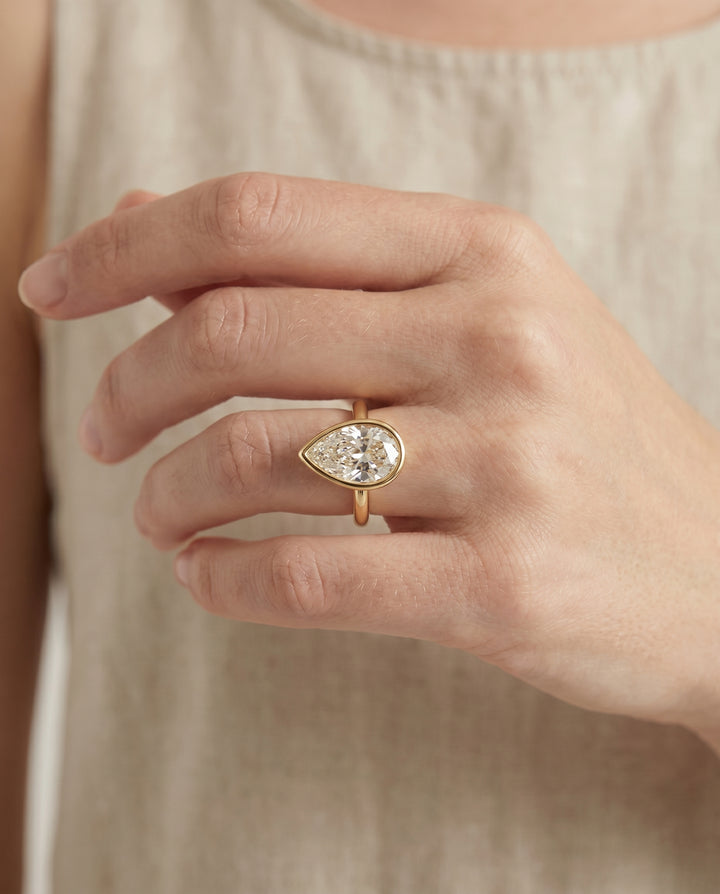 The Agnes Bezel Solitaire In Briolette Engagement Ring Setting in 18K Yellow Gold