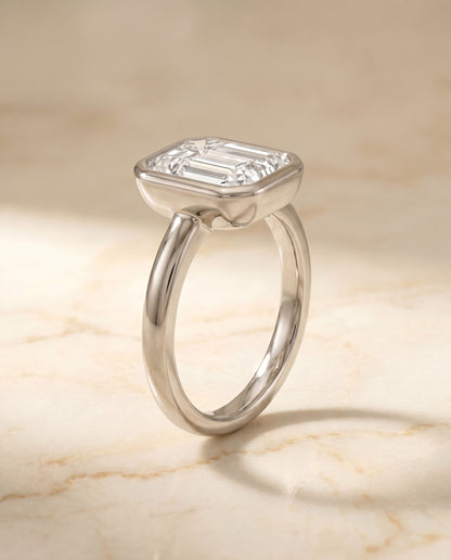 The Agnes Bezel Solitaire In Emerald Cut Engagement Ring Setting in Platinum
