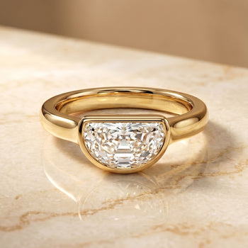 The Agnes Bezel Solitaire In Half Moon Engagement Ring Setting in 18K Yellow Gold